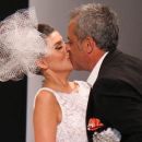   ¡A puro amor! Loly y Rial a los besos en plena pasarela